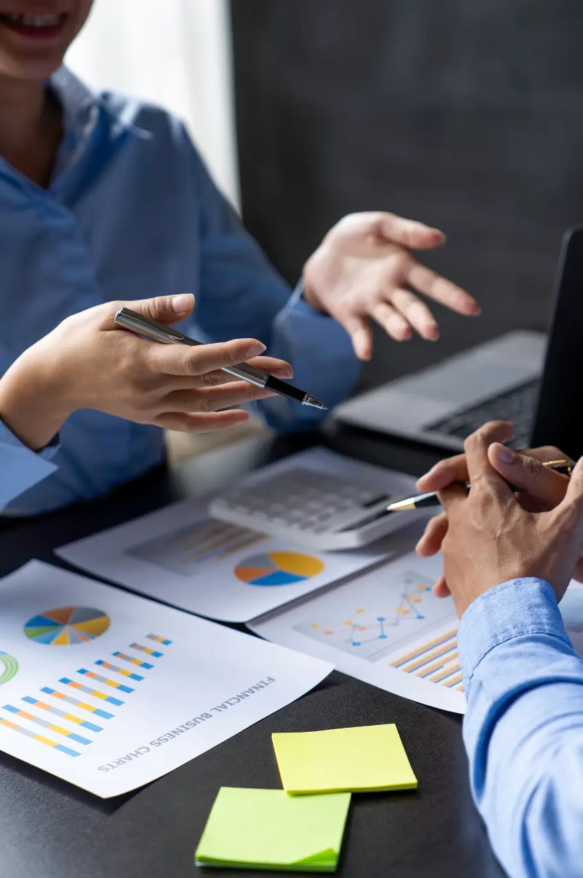 A marketing team reviewing conversion data for a landing page